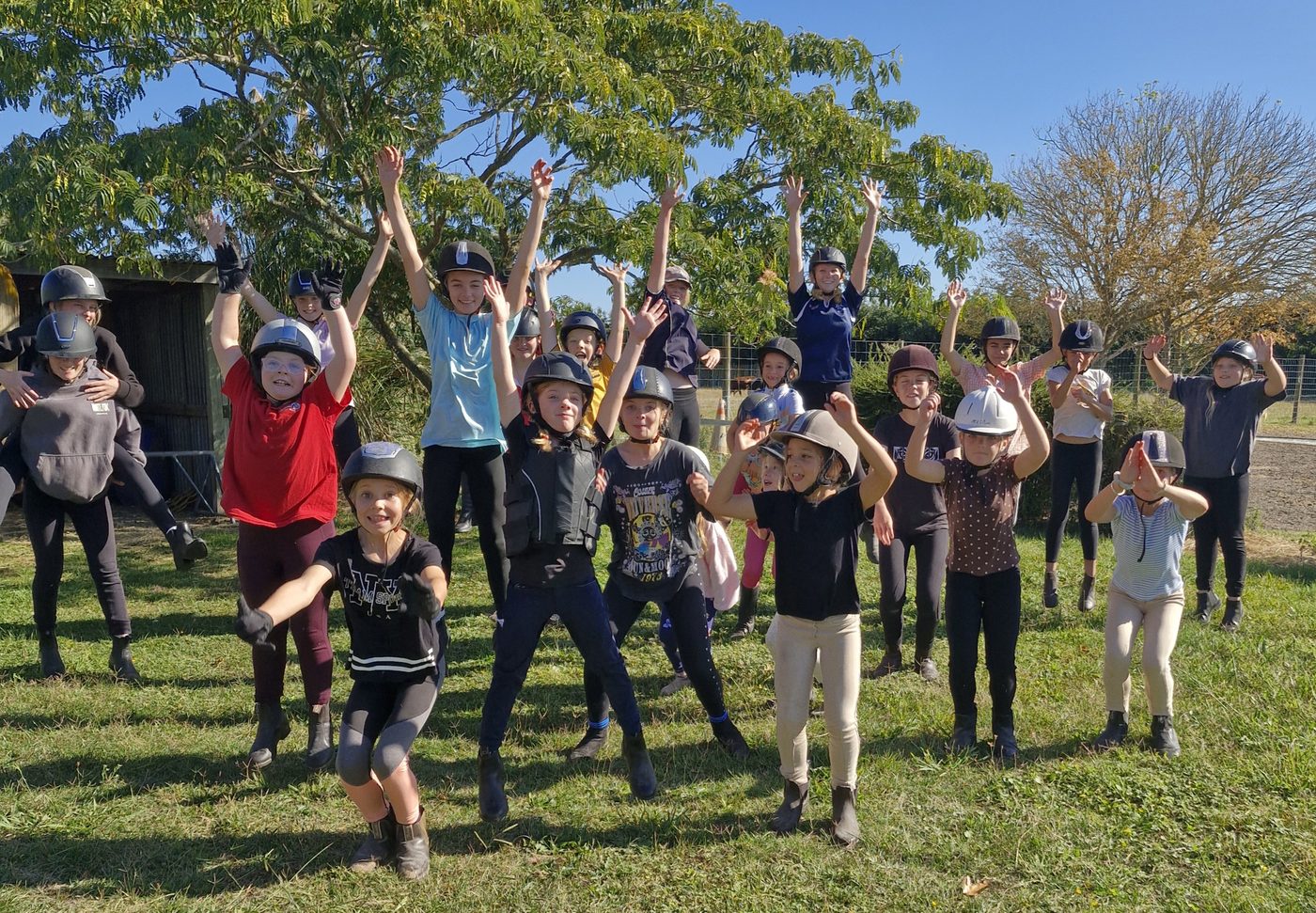 Holiday programme group cheering at Acreswild